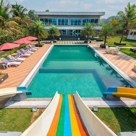 Saffronstays Palm Paradise, Kalyan Khadavli - Swimming Pool With Water Slides, Gazebo And Indoor Games Padghe Kültér fotó