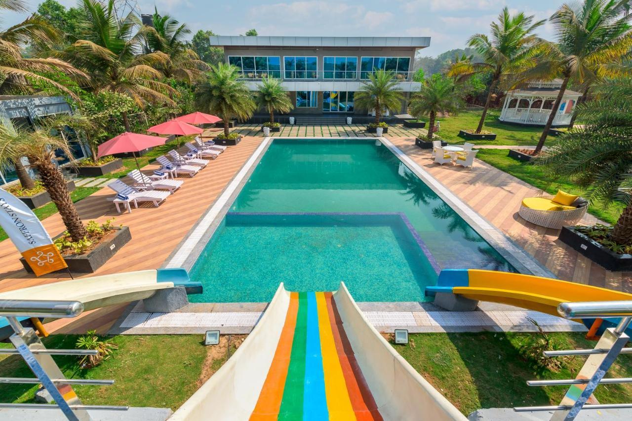 Saffronstays Palm Paradise, Kalyan Khadavli - Swimming Pool With Water Slides, Gazebo And Indoor Games Padghe Kültér fotó